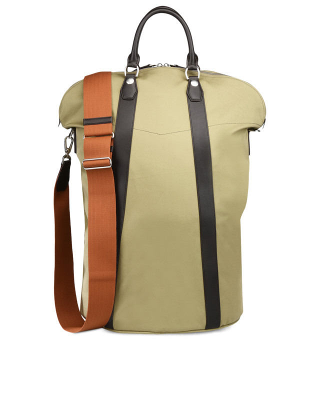 Bag is shown in green with chocolate leather trim