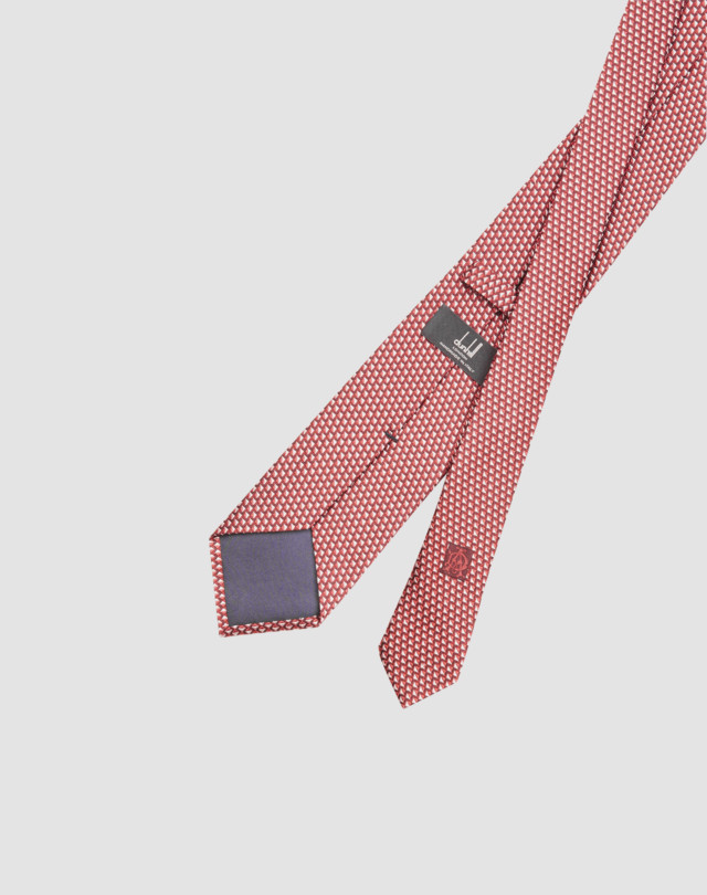 Tie is shown in gold with tonal geometric micro square pattern