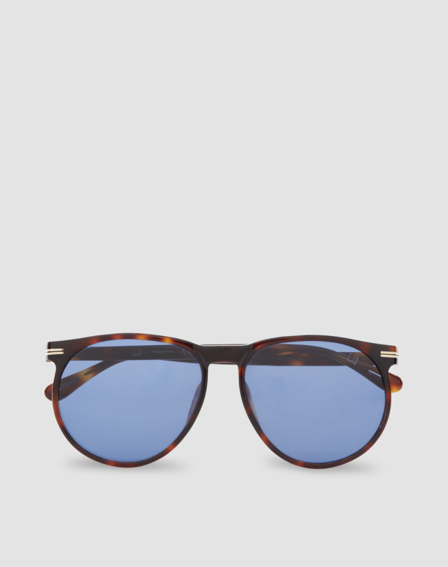 Sunglasses shown in Havana tan tortoiseshell acetate with blue lenses